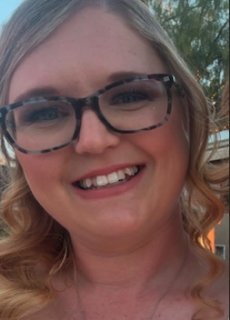 Headshot of a smiling staff member